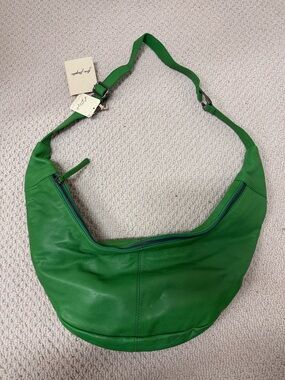Free People Idle Hands Sling Bag in Putt Putt Green
